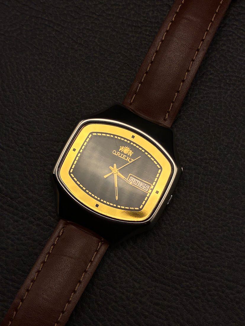 Orient Square Preto e Dourado